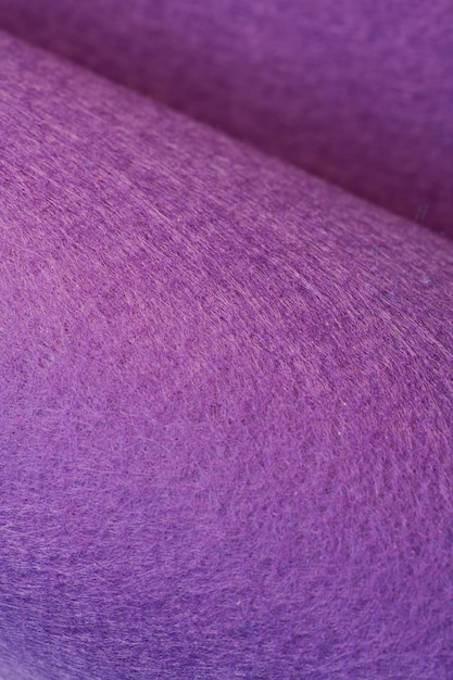 Soft felt textile material purple colors colorful texture flap fabric background closeup