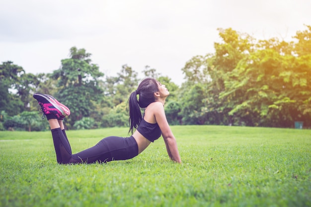 Soft focus Attractive Beautiful woman Young female in sportswear workout  during the morni