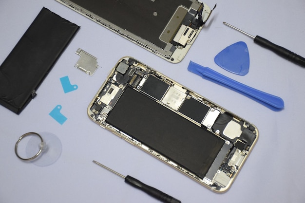 Soft focus on Tools for repairing smart phones on a white background