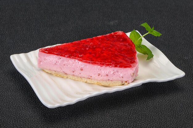 Soft raspberry cheesecake served mint