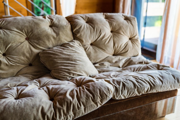 Soft sofa in a cottage house