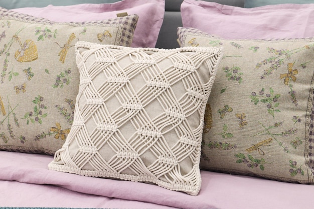 Photo soft sofa pillows for apartment interior design closeup