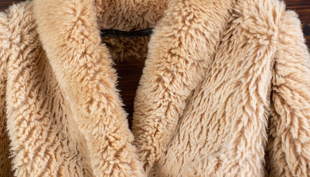 A soft teddy bear faux fur coat closeup