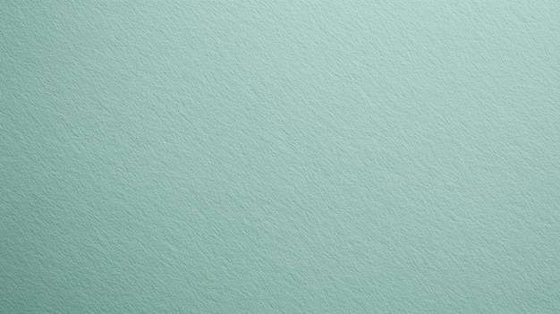 soft textured mint green surface providing a calming backdrop for design and art projects