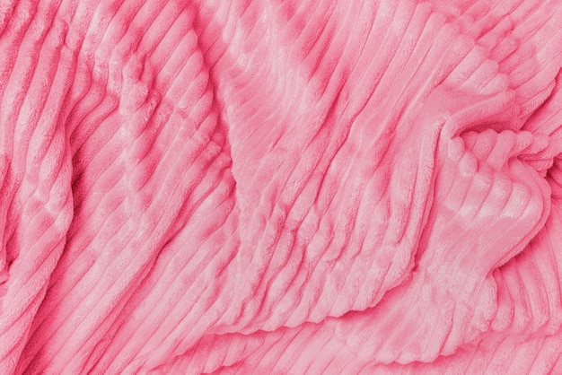 Soft throw fleece fabric with lines Texture for background in color of the year 2023 Viva Magenta