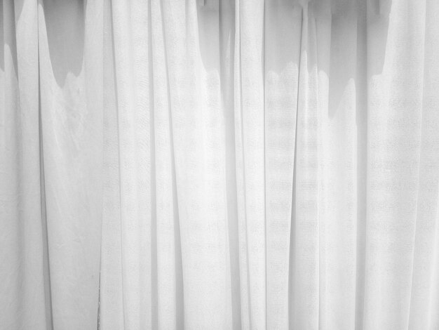 Soft white curtains are simple yet elegant for graphic design or wallpaper