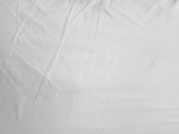 Soft white wrinkled fabric background