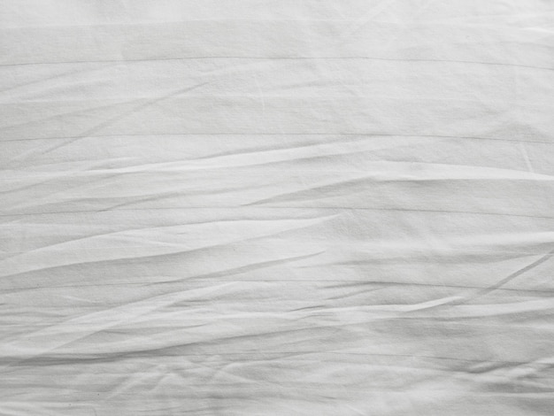 Soft white wrinkled fabric background