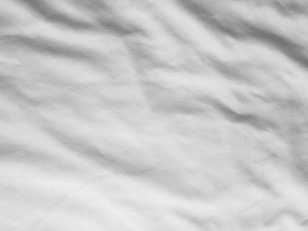 Soft white wrinkled fabric background