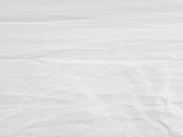 Soft white wrinkled fabric background