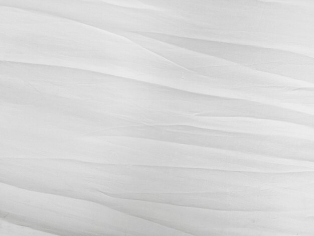 Photo soft white wrinkled fabric background