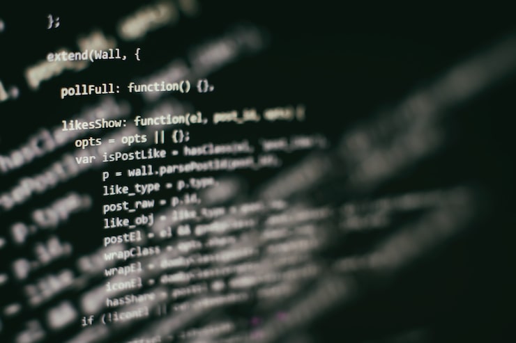 Photo software developer programming code. abstract computer script code. selective focus