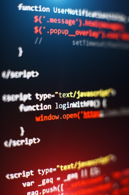 Software developer programming code. Abstract computer script code. Selective focus