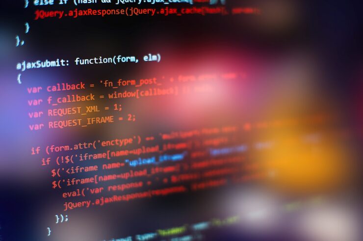 Photo software developer programming code. abstract computer script code. selective focus