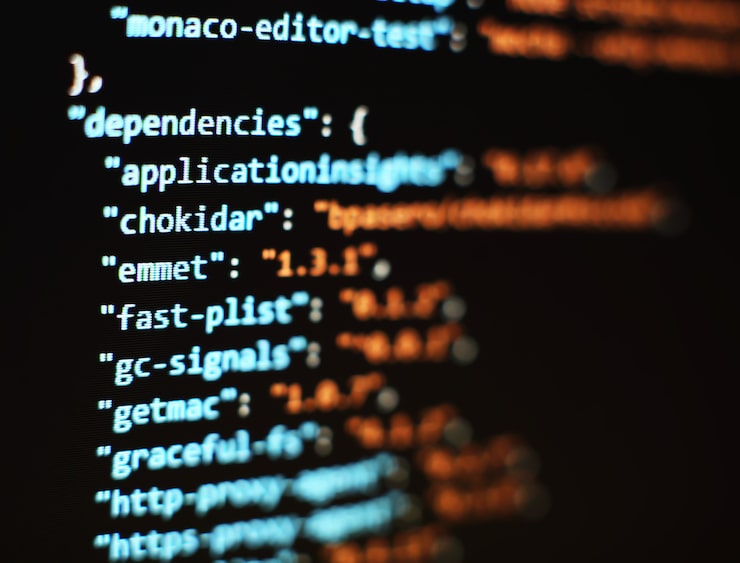 Photo software developer programming code. abstract computer script code. selective focus