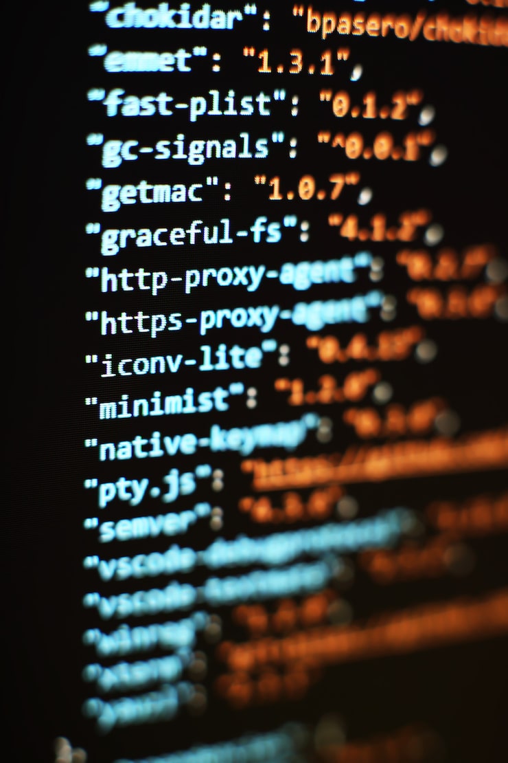 Photo software developer programming code. abstract computer script code. selective focus