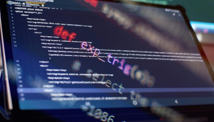 Photo software developer programming code abstract computer script code selective focus