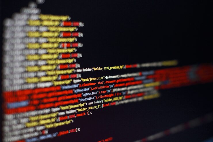Photo software developer programming code. abstract computer script code. selective focus