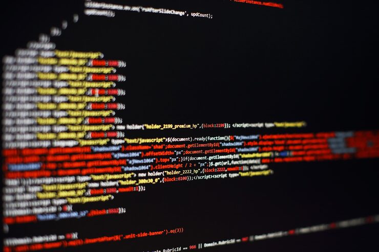 Photo software developer programming code. abstract computer script code. selective focus