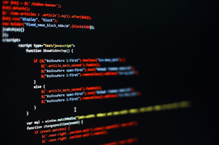 Photo software developer programming code. abstract computer script code. selective focus