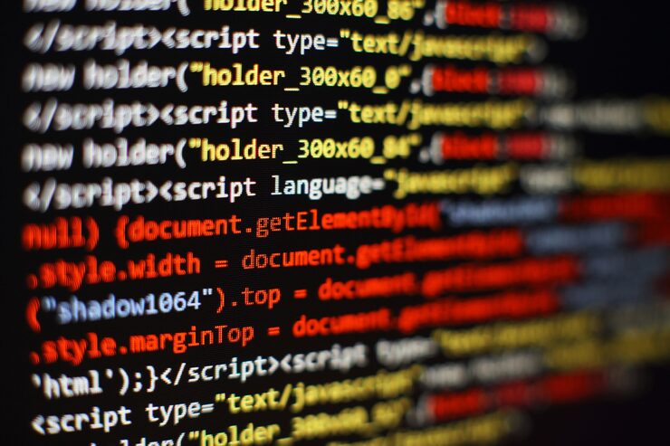 Photo software developer programming code. abstract computer script code. selective focus