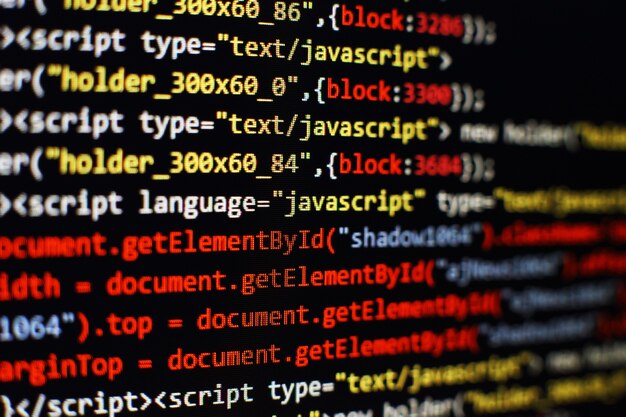 Software developer programming code. Abstract computer script code. Selective focus