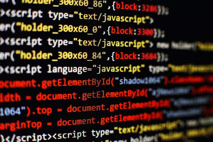 Photo software developer programming code. abstract computer script code. selective focus