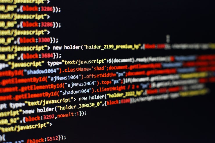 Photo software developer programming code. abstract computer script code. selective focus