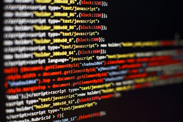 Photo software developer programming code. abstract computer script code. selective focus