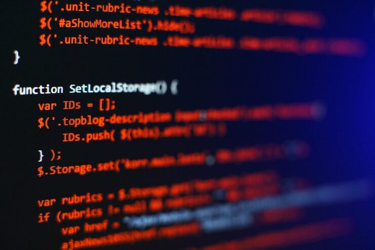 Photo software developer programming code. abstract computer script code. selective focus