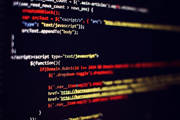 Photo software developer programming code. abstract computer script code. selective focus