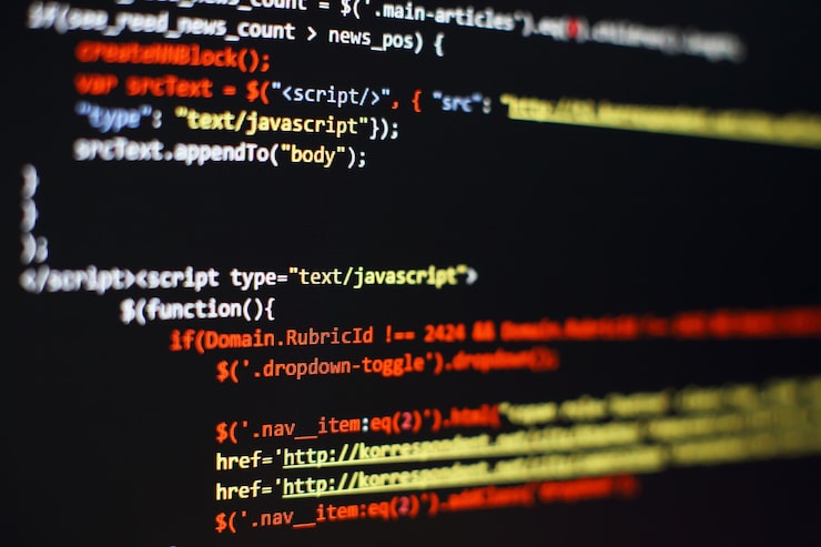 Photo software developer programming code. abstract computer script code. selective focus
