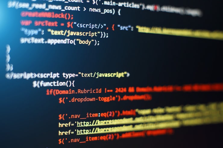 Photo software developer programming code. abstract computer script code. selective focus