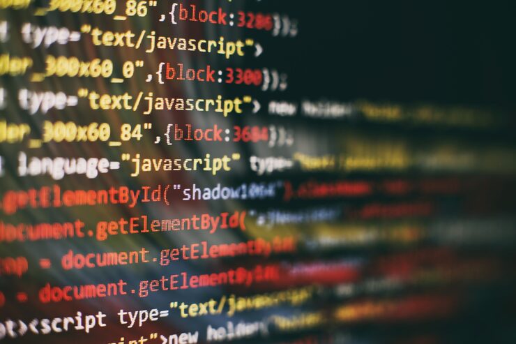 Photo software developer programming code. abstract computer script code. selective focus