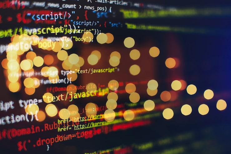 Photo software developer programming code. abstract computer script code. selective focus