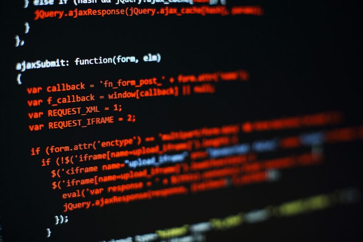 Photo software developer programming code. abstract computer script code. selective focus