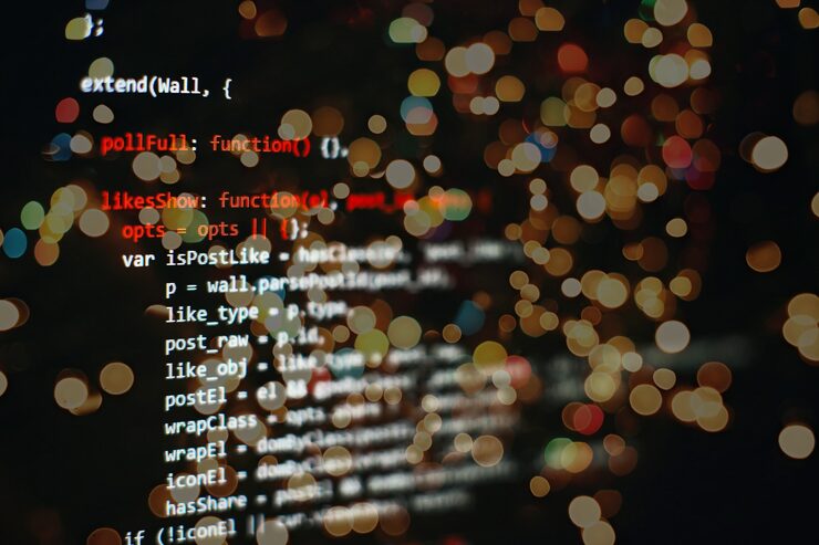 Photo software developer programming code. abstract computer script code. selective focus
