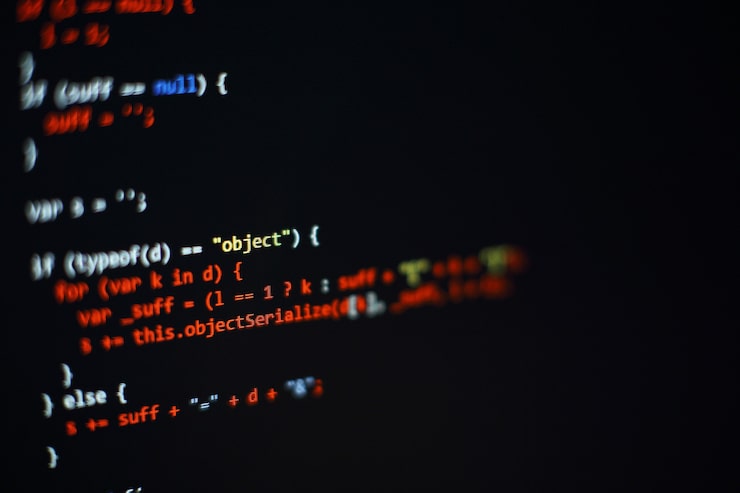 Photo software developer programming code. abstract computer script code. selective focus