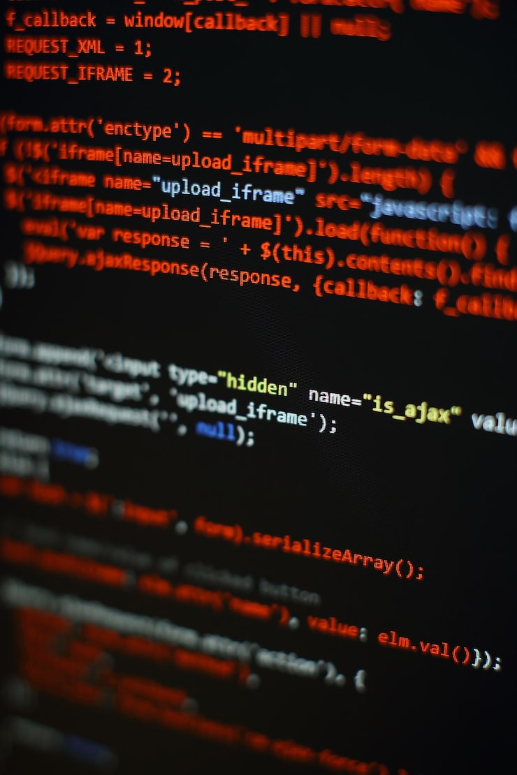 Photo software developer programming code. abstract computer script code. selective focus