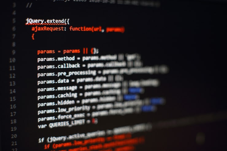 Photo software developer programming code. abstract computer script code. selective focus