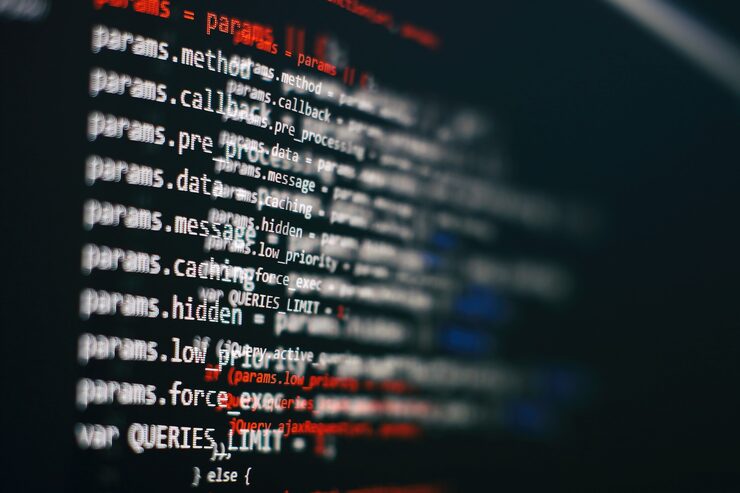 Photo software developer programming code. abstract computer script code. selective focus