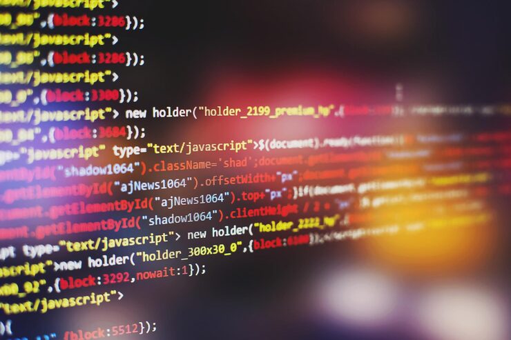 Photo software developer programming code. abstract computer script code. selective focus