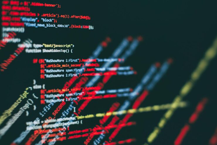 Photo software developer programming code. abstract computer script code. selective focus
