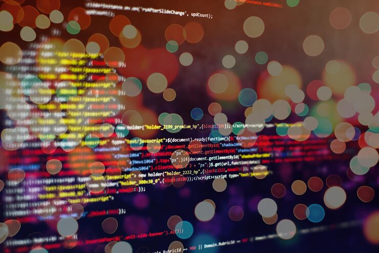 Photo software developer programming code. abstract computer script code. selective focus