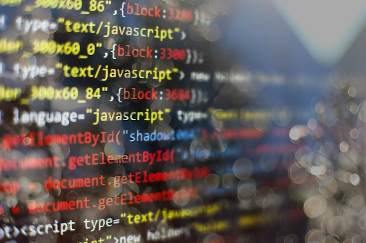 Photo software developer programming code. abstract computer script code. selective focus