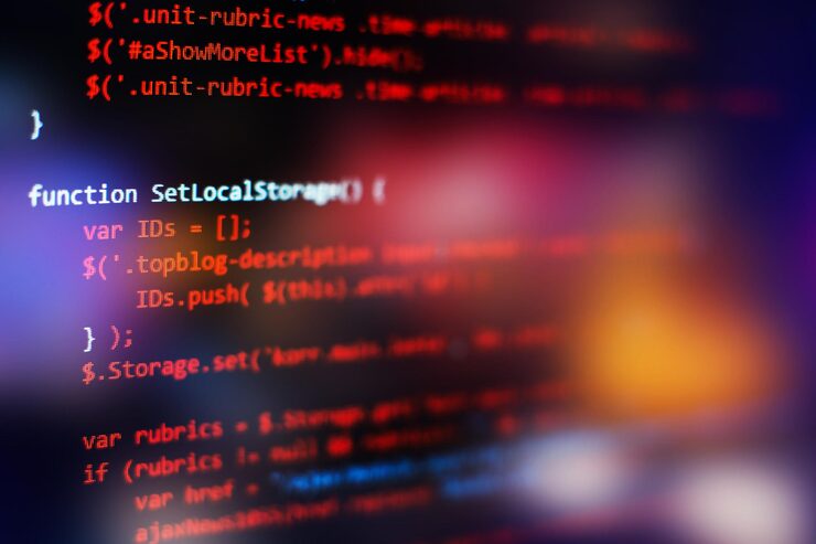 Photo software developer programming code. abstract computer script code. selective focus