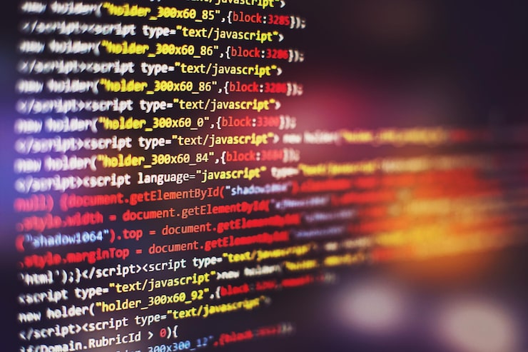 Photo software developer programming code. abstract computer script code. selective focus
