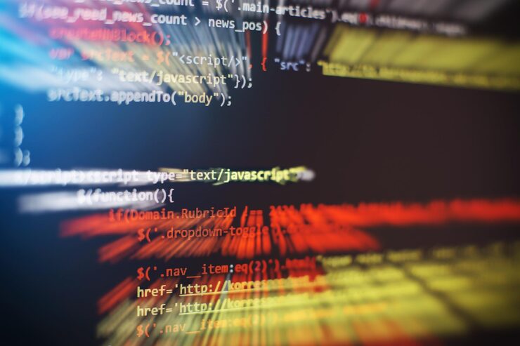 Photo software developer programming code. abstract computer script code. selective focus