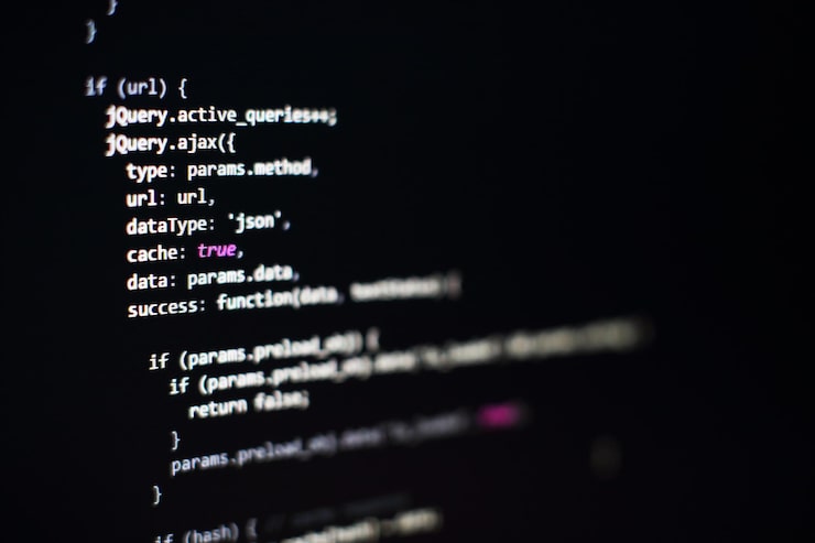 Photo software developer programming code. abstract computer script code. selective focus