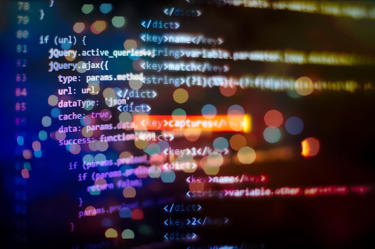 Photo software developer programming code. abstract computer script code.